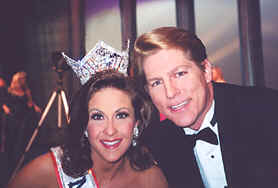 Ms. US Continental, Cammie Sanders, after winning the title on August 31st, 2002, with her husband, Kevin Sanders.  Kevin is her number one supporter, photographer, consultant, mock interview coach, parade car driver, and fitness trainer.