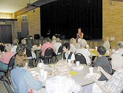 Cammie Sanders, Ms. US Continental 2002, entertains for a luncheon at St. Paul United Methodist.