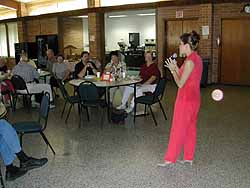 Cammie Sanders, Ms. US Continental 2002, entertains for a luncheon at St. Paul United Methodist.