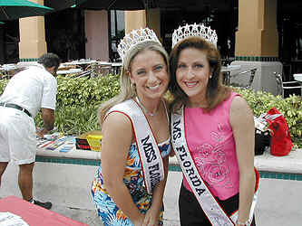 Cammie Sanders, Ms. Florida US Continental 2002, with Rebecca Stone, Miss Florida Teen US Continental 2002, at the Winterfest kick off at the Riverfront in Ft. Lauderdale, Florida.