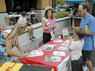 Cammie Sanders, Ms. Florida US Continental 2002, with Rebecca Stone, Miss Florida Teen US Continental 2002, at the Winterfest kick off at the Riverfront in Ft. Lauderdale, Florida.