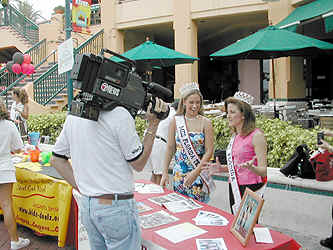 Cammie Sanders, Ms. Florida US Continental 2002, with Rebecca Stone, Miss Florida Teen US Continental 2002, at the Winterfest kick off at the Riverfront in Ft. Lauderdale, Florida.